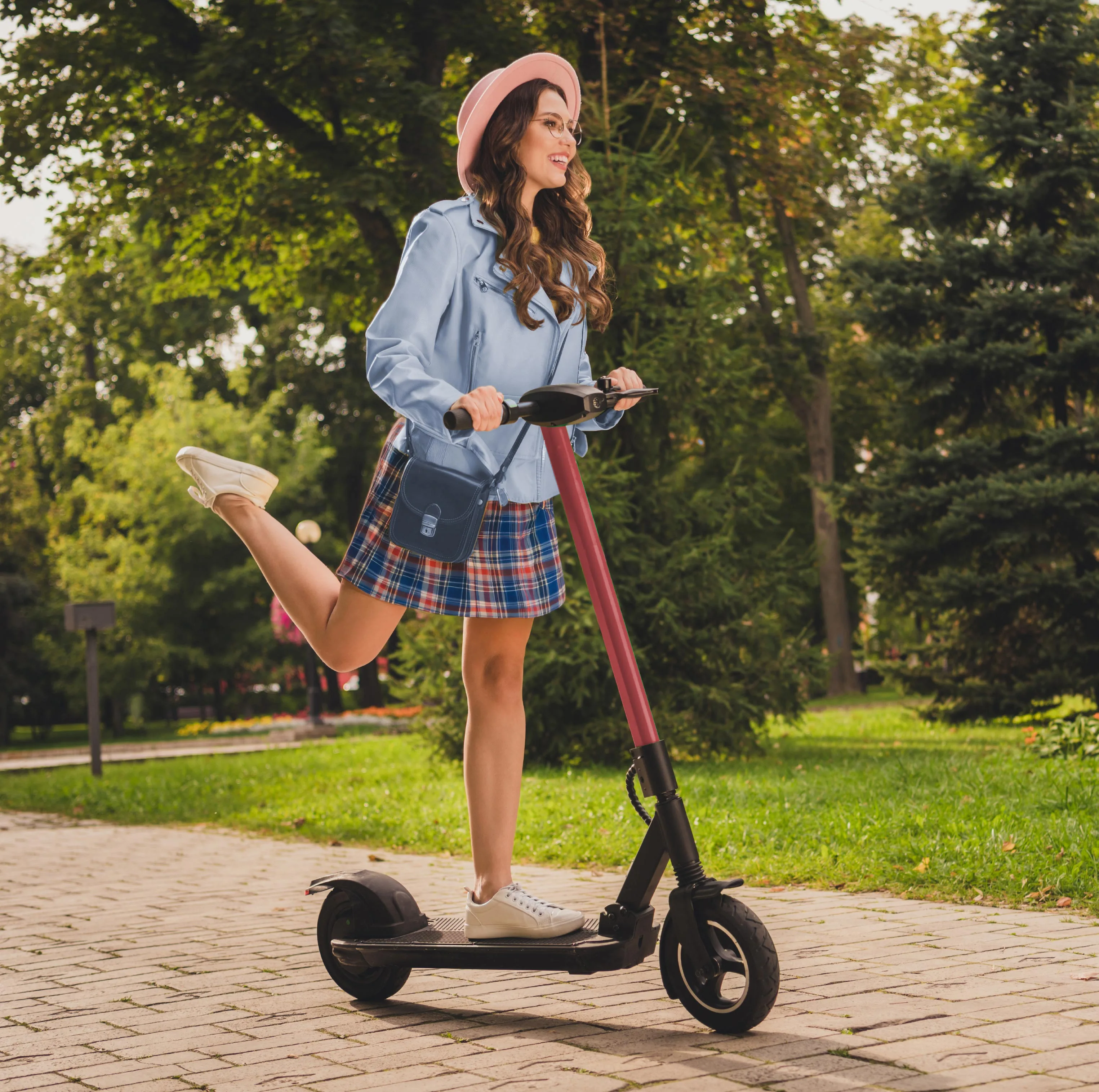 Child on a scooter in a neighbourhood setting used in Bolton Place marketing photography.
