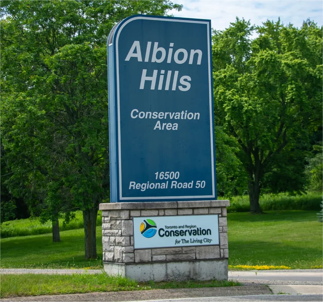 Wooded trail near Bolton, Caledon — parks and trail context for Bolton Place by Opus Homes.